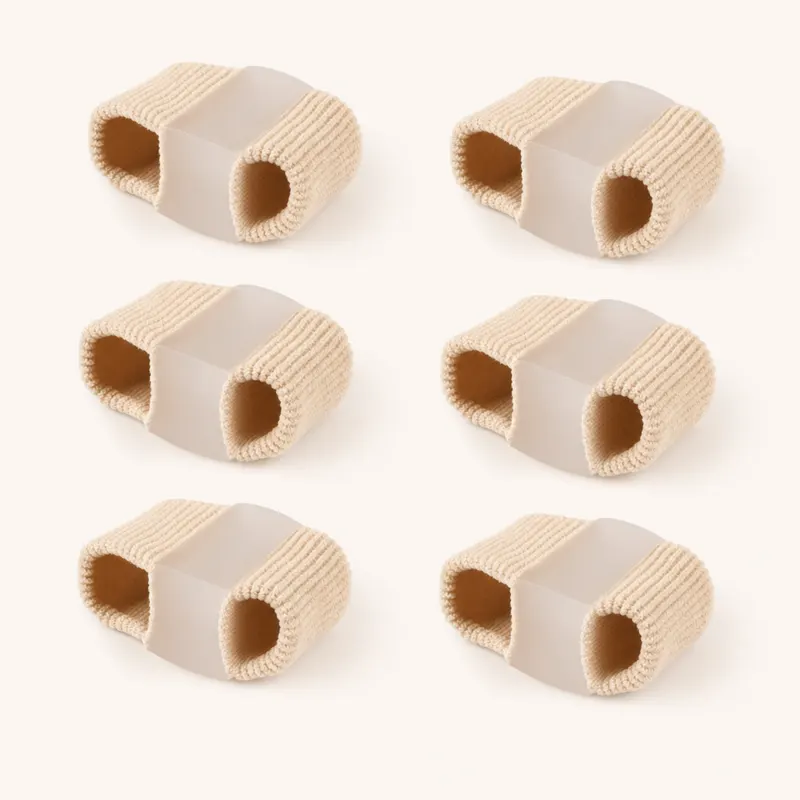 Beige fabric-covered toe separator tubes in sizes S and L